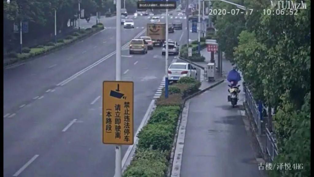 司机|打开后备箱躲避违停抓拍 司机按遮挡号牌被处罚