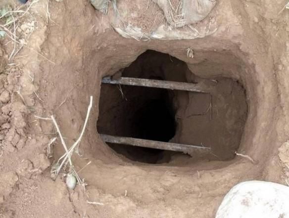 深夜|一团伙白天开饭店深夜挖地道盗文物