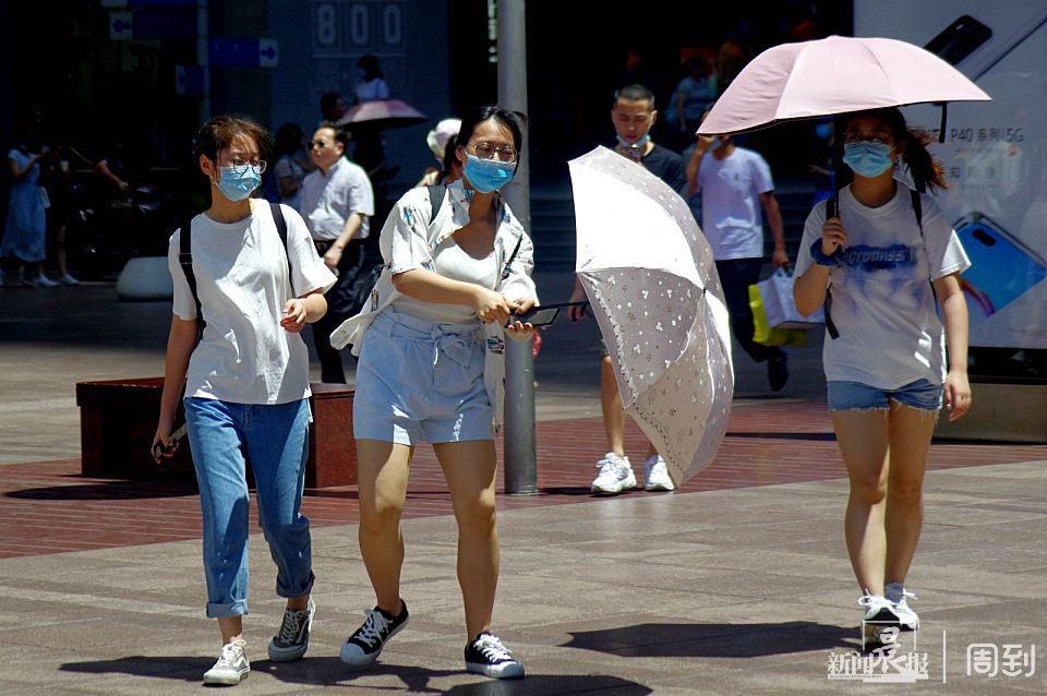 晨镜头|申城风力增大，吹乱秀发、吹翻伞 | 吹乱