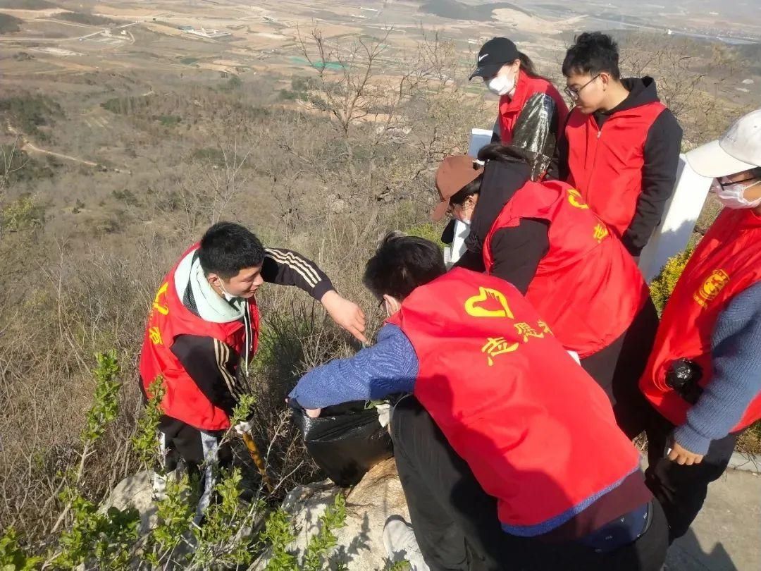 温暖|这就是文明乳山 | 一抹“志愿红” 温暖一座城