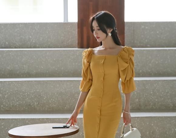 嫩黄|孙允珠：蛋挞夏荣絮彩花边嫩黄连衣裙写真