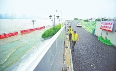 身上|守堤人：英雄城市有韧性，我们身上有血性