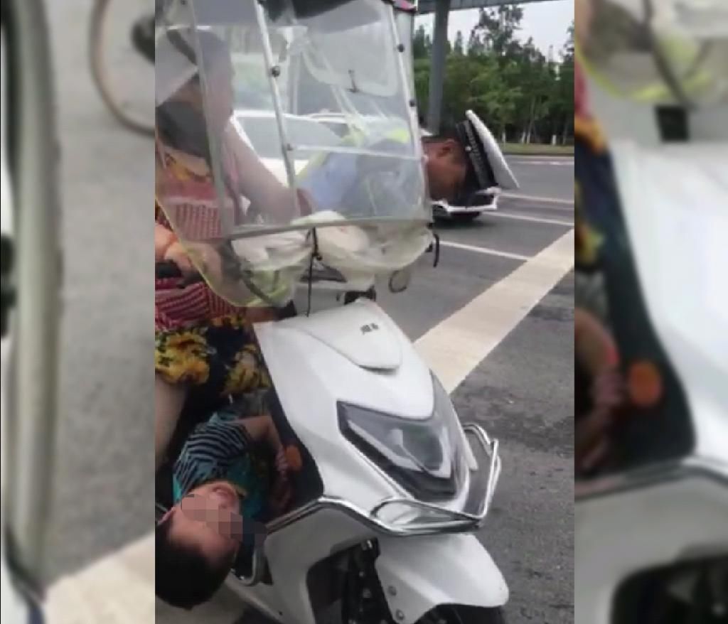  绑住|女子将9岁儿子绑住手脚塞在电动车座下方，孩子手发紫，胳膊出血