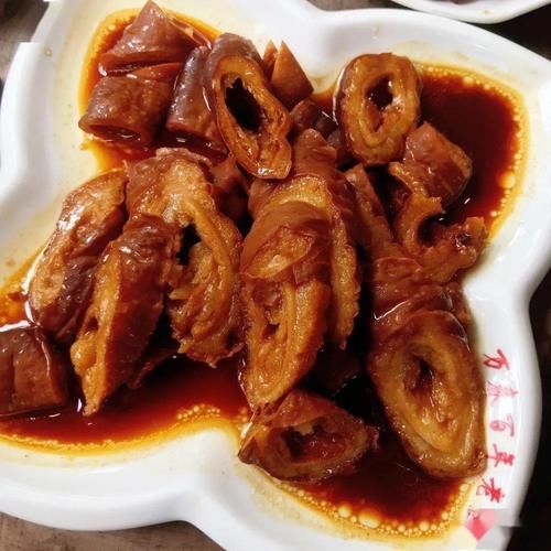 崇州|崇州味道,万春老卤的鸭头,一口咬下去