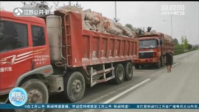  超载|货车装载石块堆成“山”，过磅结果超载200%以上
