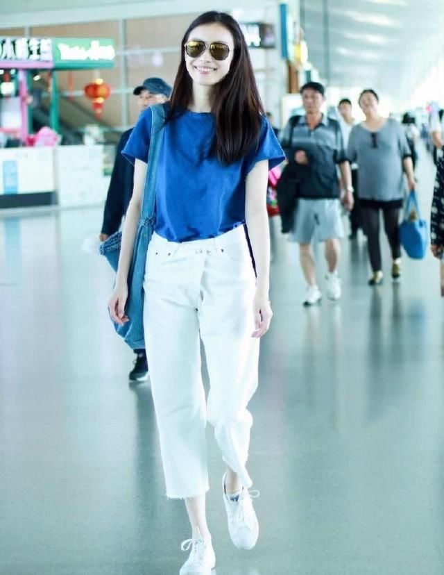  hold|倪妮要不要这么飒？新造型气场“一米八”，锯齿刘海也能轻松hold住