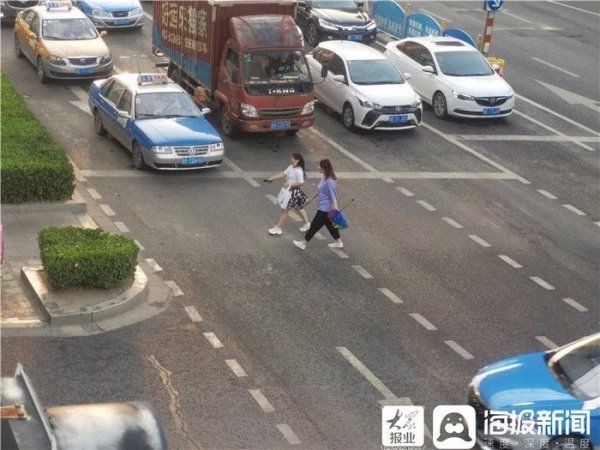 西城|东营区西城现“太阳雨” 街上行人赶路忙