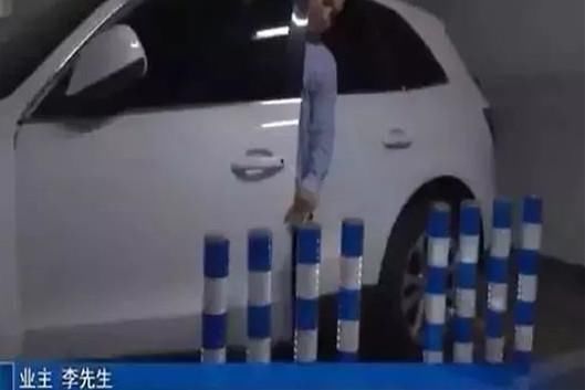  越线|8根铁柱钉严实，专治各种车位越线，邻居投诉后：治的就是你！
